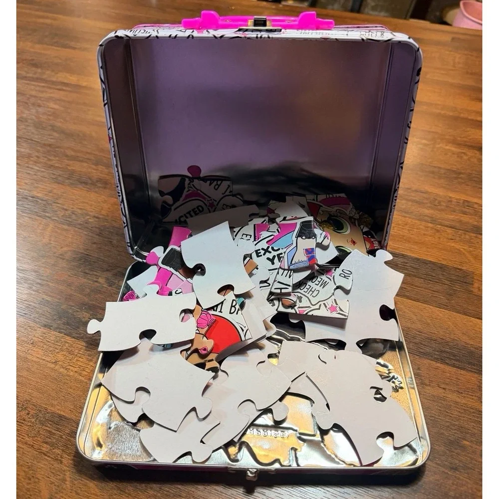 LOL Surprise lunch tin box with 48 piece puzzle inside.